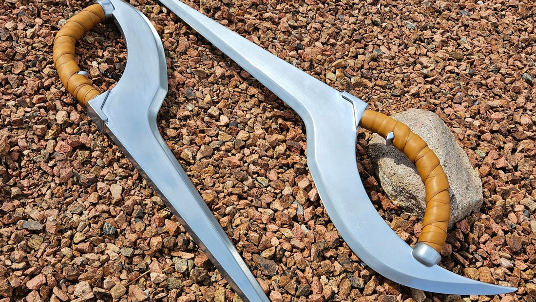 Finished 3D printed Sangheili Curved Blades with silver blades and wrapped handles by Alpha to Zeta Industries