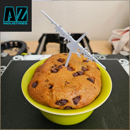 3D printed military aircraft cupcake toppers displayed on cupcakes