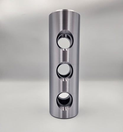 3D printed 1:1 scale 30mm Bushmaster muzzle brake replica in silver PLA