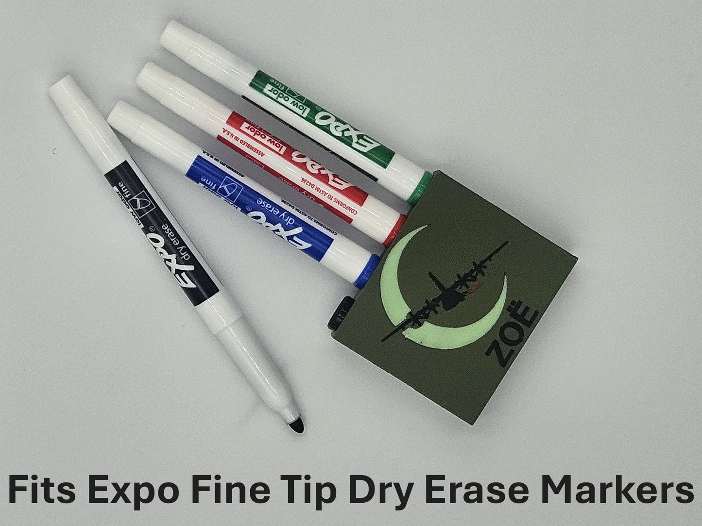 Custom 3D printed magnetic dry erase marker holder personalized with name on metal surface