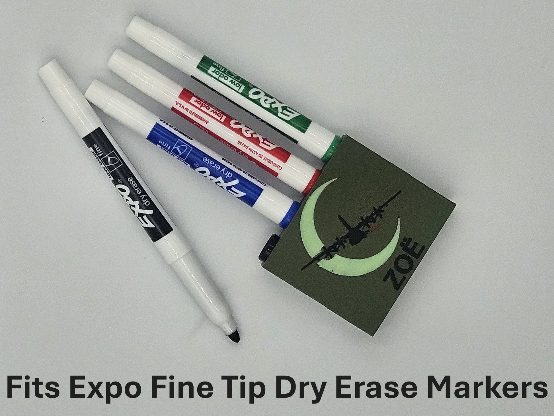 Custom 3D printed magnetic dry erase marker holder personalized with name on metal surface