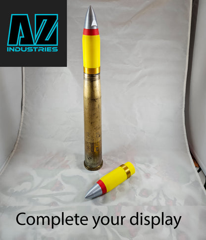 3D printed 40mm brass shell casing topper displayed upright